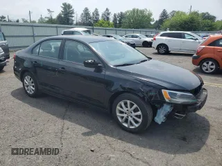 2015 Volkswagen Jetta SE with VIN 3VWD17AJ1FM349301, listed as a Copart auction lot 58963255 with 156,480 mi miles and Salvage title. Bid and sale history available at DreamBid. Image 4.