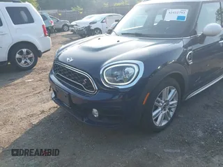 2018 MINI Countryman Cooper S z VIN WMZYT5C3XJ3E60444, wystawiony jako IAAI lot #42422793 z przebiegiem 96 722 mil mil oraz . Historia ofert i sprzedaży dostępna na DreamBid. Obrazek 6.