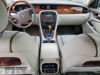 2005 Jaguar XJ VDP with VIN SAJWA82C45SG36059, listed as a Copart auction lot 69289734 with 0 mi miles and Salvage Title. Bid and sale history available at carsss.com. Image 8.