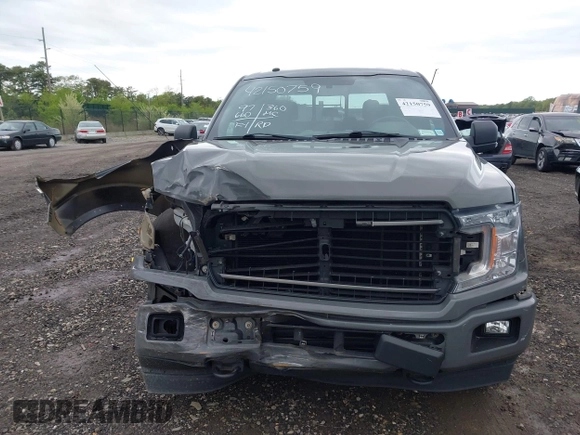 2018 Ford F-150 XL with VIN 1FTEW1EPXJFC85210, listed as a IAAI auction lot 42150759 with 97,660 mi miles and . Bid and sale history available at carsss.com. Image 12.