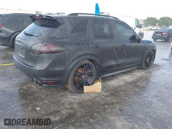 2014 Porsche Cayenne GTS with VIN WP1AD2A28ELA74131, listed as a IAAI auction lot 42829362 with Not provided miles and . Bid and sale history available at DreamBid. Image 4.