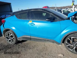 2019 Toyota C-HR XLE with VIN JTNKHMBX9K1056627, listed as a IAAI auction lot 41030089 with 1 mi miles. Bid and sale history available at carsss.com. Image 12.
