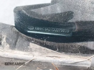 2013 Hyundai Genesis Coupe Premium with VIN KMHHT6KD7DU079819, listed as a IAAI auction lot 40863494 with 111,012 mi miles and . Bid and sale history available at DreamBid. Image 12.