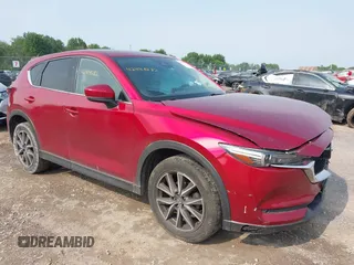 2018 Mazda CX-5 Grand Touring with VIN JM3KFBDM2J0448555, listed as a IAAI auction lot 42449282 with 65,770 mi miles and . Bid and sale history available at DreamBid. Image 1.