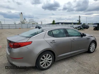2015 Kia Optima EX with VIN 5XXGN4A75FG456554, listed as a Copart auction lot 58704005 with 114,146 mi miles and Salvage title. Bid and sale history available at DreamBid. Image 3.