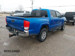 2016 Toyota Tacoma SR with VIN 5TFCZ5AN4GX013233, listed as a IAAI auction lot 41394610 with 142,099 mi miles and . Bid and sale history available at DreamBid. Image 4.