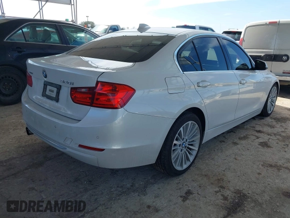 2013 BMW 3 Series 328i xDrive with VIN WBA3B3G53DNR79514, listed as a IAAI auction lot 41662949 with 104,125 mi miles. Bid and sale history available at carsss.com. Image 4.