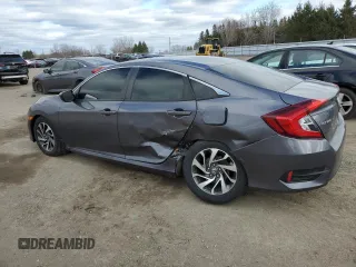 2017 Honda Civic EX with VIN 2HGFC2F87HH016523, listed as a Copart auction lot 53541115 with 156,221 mi miles and Salvage Title. Bid and sale history available at DreamBid. Image 2.
