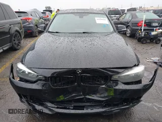 2015 BMW 3 Series 328i with VIN WBA3A5C59FF606236, listed as a IAAI auction lot 41690502 with 115,085 mi miles. Bid and sale history available at carsss.com. Image 12.