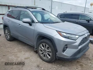 2024 Toyota RAV4 XLE Premium with VIN 2T3C1RFV2RC263246, listed as a IAAI auction lot 42156347 with 23,456 mi miles and . Bid and sale history available at DreamBid. Image 1.
