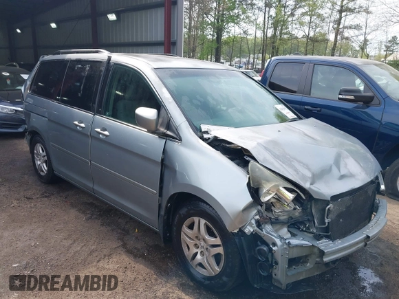 2006 Honda Odyssey EX with VIN 5FNRL38406B066176, listed as a IAAI auction lot 42028052 with 136,305 mi miles and . Bid and sale history available at DreamBid. Image 1.