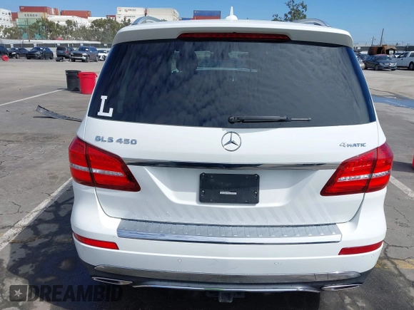 2018 Mercedes-Benz GLS 450 with VIN 4JGDF6EE9JB049030, listed as a IAAI auction lot 41804243 with 60,985 mi miles and . Bid and sale history available at DreamBid. Image 17.
