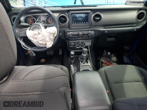 2020 Jeep Gladiator Sport S с VIN 1C6HJTAG5LL153853, выставлен на аукционе Copart как лот 56023925 с пробегом 31 143 миль миль и Списание • Salvage title. История ставок и продаж доступна на DreamBid. Изображение 8.