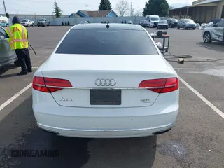 2015 Audi A8 4.0T with VIN WAU32AFD6FN039739, listed as a IAAI auction lot 41946401 with 102,668 mi miles and . Bid and sale history available at DreamBid. Image 16.