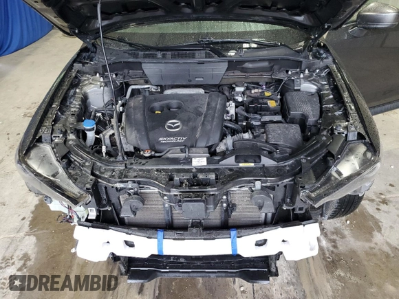 2018 Mazda CX-5 Grand Touring with VIN JM3KFBDM1J0440849, listed as a Copart auction lot 58354655 with 43,348 mi miles and Salvage title. Bid and sale history available at DreamBid. Image 12.