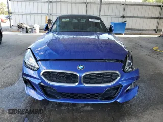 2025 BMW Z4 sDrive30i with VIN WBAHF3C08SWY44282, listed as a Copart auction lot 50553575 with 5,765 mi miles and Clean Title. Bid and sale history available at carsss.com. Image 5.