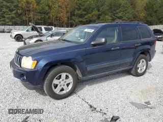2005 Jeep Grand Cherokee Laredo with VIN 1J4HS48N75C724594, listed as a Copart auction lot 77941094 with Not Provided miles and Salvage Title. Bid and sale history available at DreamBid. Image 1.