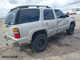 2005 Chevrolet Tahoe Z71 with VIN 1GNEK13T05R246648, listed as a IAAI auction lot 41483045 with 312,536 mi miles. Bid and sale history available at carsss.com. Image 4.
