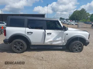 2021 Ford Bronco with VIN 1FMDE5BH6MLA80102, listed as a IAAI auction lot 42126680 with 67,913 mi miles and . Bid and sale history available at DreamBid. Image 13.