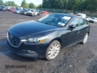 2017 Mazda 3 Touring z VIN 3MZBN1V74HM128575, wystawiony jako IAAI lot #42731487 z przebiegiem 136 553 mil mil oraz . Historia ofert i sprzedaży dostępna na DreamBid. Obrazek 17.