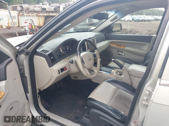 2009 Jeep Grand Cherokee Limited with VIN 1J8GR58K19C550500, listed as a IAAI auction lot 42700453 with 151,238 mi miles and . Bid and sale history available at DreamBid. Image 5.