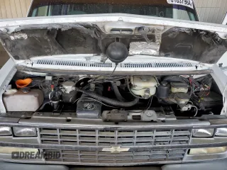 1992 Chevrolet Chevy Van z VIN 1GBEG25K3N7110762, wystawiony jako Copart lot #81037964 z przebiegiem 202 599 mil mil oraz Czysty tytuł • Clean title. Historia ofert i sprzedaży dostępna na DreamBid. Obrazek 12.