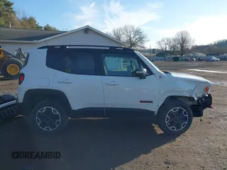 2017 Jeep Renegade Deserthawk z VIN ZACCJBCBXHPG50494, wystawiony jako IAAI lot #41858069 z przebiegiem 98 174 mil mil oraz . Historia ofert i sprzedaży dostępna na DreamBid. Obrazek 14.