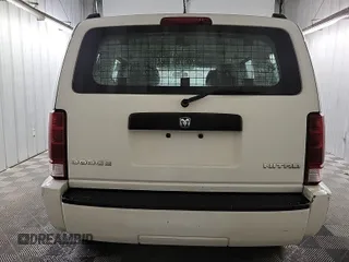 2011 Dodge Nitro SE z VIN 1D4PT2GK2BW589063, wystawiony jako IAAI lot #42408917 z przebiegiem 160 504 mil mil oraz . Historia ofert i sprzedaży dostępna na DreamBid. Obrazek 4.