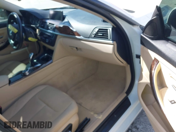 2015 BMW 4 Series 428i xDrive with VIN WBA4C9C56FG135520, listed as a IAAI auction lot 41574336 with 70,870 mi miles and . Bid and sale history available at carsss.com. Image 5.