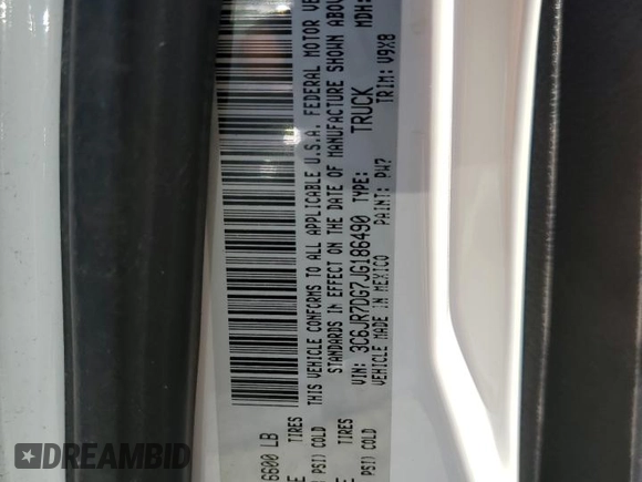 2018 Ram 1500 Tradesman with VIN 3C6JR7DG7JG186490, listed as a Copart auction lot 74712524 with 58,120 mi miles and Salvage title. Bid and sale history available at DreamBid. Image 13.