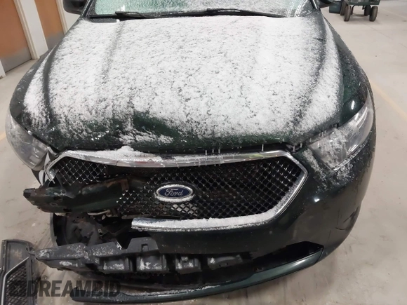 2013 Ford Taurus SHO z VIN 1FAHP2KT8DG142620, wystawiony jako IAAI lot #41800583 z przebiegiem 175 812 mil mil oraz . Historia ofert i sprzedaży dostępna na DreamBid. Obrazek 13.