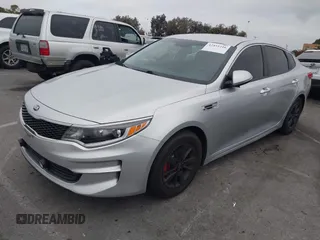 2018 Kia Optima S with VIN 5XXGT4L35JG216039, listed as a IAAI auction lot 42451216 with 91,679 mi miles and . Bid and sale history available at DreamBid. Image 2.
