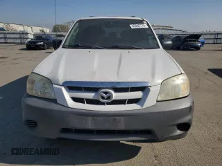 2005 Mazda Tribute i with VIN 4F2YZ02Z95KM24700, listed as a Copart auction lot 42002775 with 128,891 mi miles and Salvage Title. Bid and sale history available at carsss.com. Image 5.
