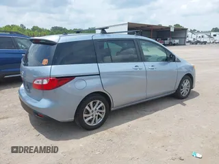 2012 Mazda 5 Sport with VIN JM1CW2BLXC0106748, listed as a IAAI auction lot 42435965 with 153,786 mi miles and . Bid and sale history available at DreamBid. Image 4.