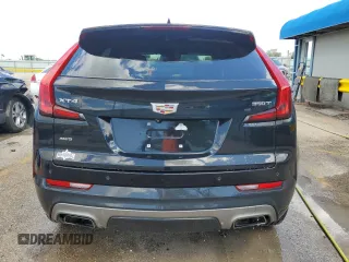 2020 Cadillac XT4 AWD Premium Luxury with VIN 1GYFZDR47LF088070, listed as a Copart auction lot 42802985 with 102,777 mi miles and Salvage Title. Bid and sale history available at carsss.com. Image 6.