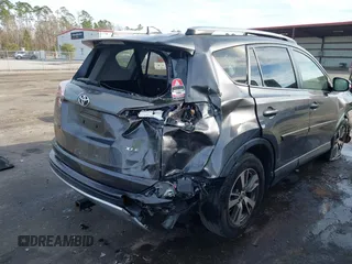 2018 Toyota RAV4 XLE with VIN JTMWFREV1JJ169926, listed as a IAAI auction lot 41464920 with 111,144 mi miles. Bid and sale history available at carsss.com. Image 6.