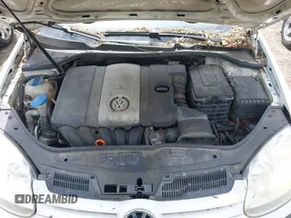 2009 Volkswagen Rabbit S z VIN WVWBB71K99W112155, wystawiony jako IAAI lot #42394254 z przebiegiem 158 219 mil mil oraz . Historia ofert i sprzedaży dostępna na DreamBid. Obrazek 10.