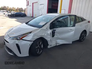 2020 Toyota Prius L Eco z VIN JTDKARFU4L3116504, wystawiony jako IAAI lot #42178279 z przebiegiem 33 668 mil mil oraz . Historia ofert i sprzedaży dostępna na DreamBid. Obrazek 2.