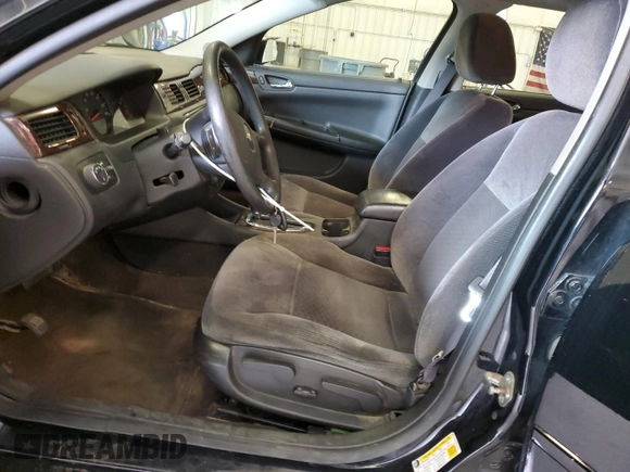 2015 Chevrolet Impala LS with VIN 2G1WA5E3XF1151683, listed as a Copart auction lot 55802995 with 150,407 mi miles and Salvage title. Bid and sale history available at DreamBid. Image 7.
