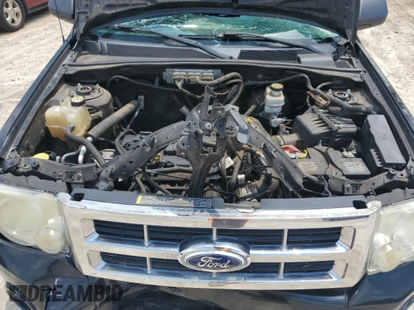 2010 Ford Escape XLS with VIN 1FMCU0C71AKC97243, listed as a Copart auction lot 63966335 with 156,065 mi miles and Non repairable. Bid and sale history available at DreamBid. Image 12.
