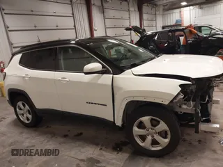 2019 Jeep Compass Latitude with VIN 3C4NJDBB0KT834607, listed as a IAAI auction lot 41932794 with 74,694 mi miles. Bid and sale history available at carsss.com. Image 14.