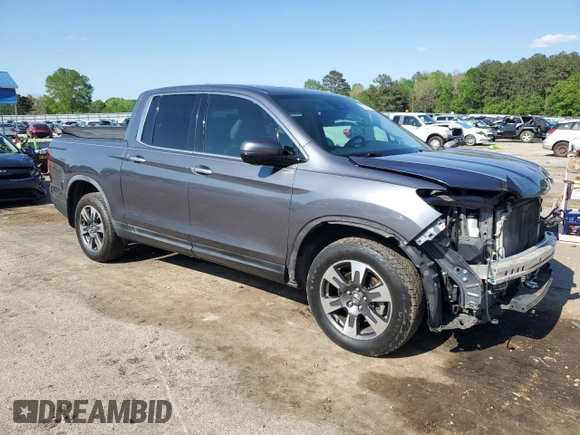2017 Honda Ridgeline RTL-E with VIN 5FPYK3F70HB004377, listed as a Copart auction lot 52201415 with 170,729 mi miles and Salvage title. Bid and sale history available at DreamBid. Image 4.