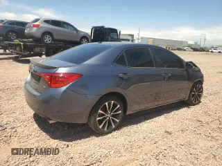 2018 Toyota Corolla L z VIN 2T1BURHE6JC112701, wystawiony jako Copart lot #55699555 z przebiegiem 54 823 mil mil oraz Szkoda całkowita • Salvage title. Historia ofert i sprzedaży dostępna na DreamBid. Obrazek 3.