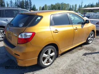 2009 Toyota Matrix S with VIN 2T1LE40E89C009775, listed as a IAAI auction lot 42086039 with 220,832 mi miles. Bid and sale history available at carsss.com. Image 4.