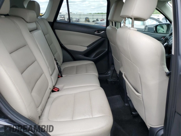 2014 Mazda CX-5 Grand Touring with VIN JM3KE4DY3E0304908, listed as a Copart auction lot 53873655 with 144,382 mi miles and Salvage Title. Bid and sale history available at DreamBid. Image 11.