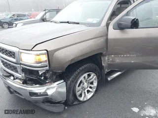2014 Chevrolet Silverado 1500 LT with VIN 3GCUKREC6EG158106, listed as a IAAI auction lot 41053248 with 139,597 mi miles. Bid and sale history available at carsss.com. Image 6.