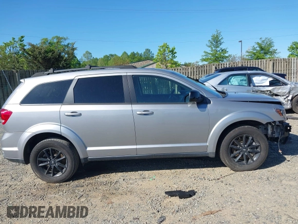 2019 Dodge Journey SE with VIN 3C4PDCBB7KT872524, listed as a IAAI auction lot 42093711 with 86,519 mi miles and . Bid and sale history available at DreamBid. Image 14.