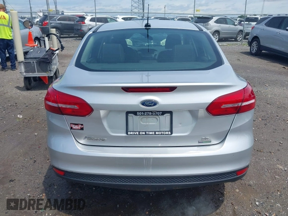 2017 Ford Focus SE with VIN 1FADP3FE4HL295573, listed as a IAAI auction lot 39562568 with 96,939 mi miles and . Bid and sale history available at carsss.com. Image 16.