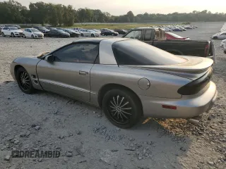 2001 Pontiac Firebird Firebird z VIN 2G2FS22K412113906, wystawiony jako Copart lot #72460364 z przebiegiem 189 679 mil mil oraz Czysty tytuł • Clean title. Historia ofert i sprzedaży dostępna na DreamBid. Obrazek 2.
