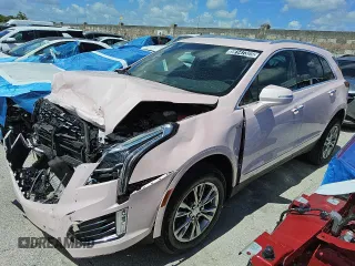2023 Cadillac XT5 FWD Premium Luxury with VIN 1GYKNCR45PZ160005, listed as a Copart auction lot 59147325 with 70,322 mi miles and Salvage title. Bid and sale history available at DreamBid. Image 1.